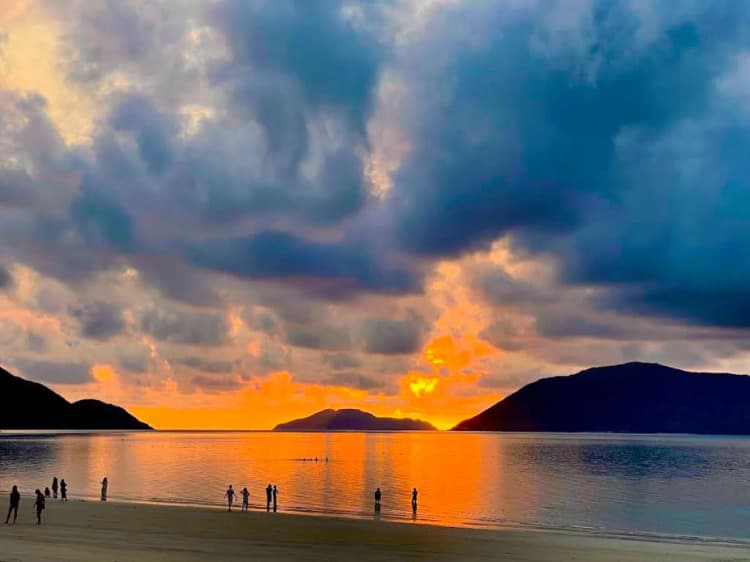 Sunset over Con Dao Island glowing with orange and purple hues