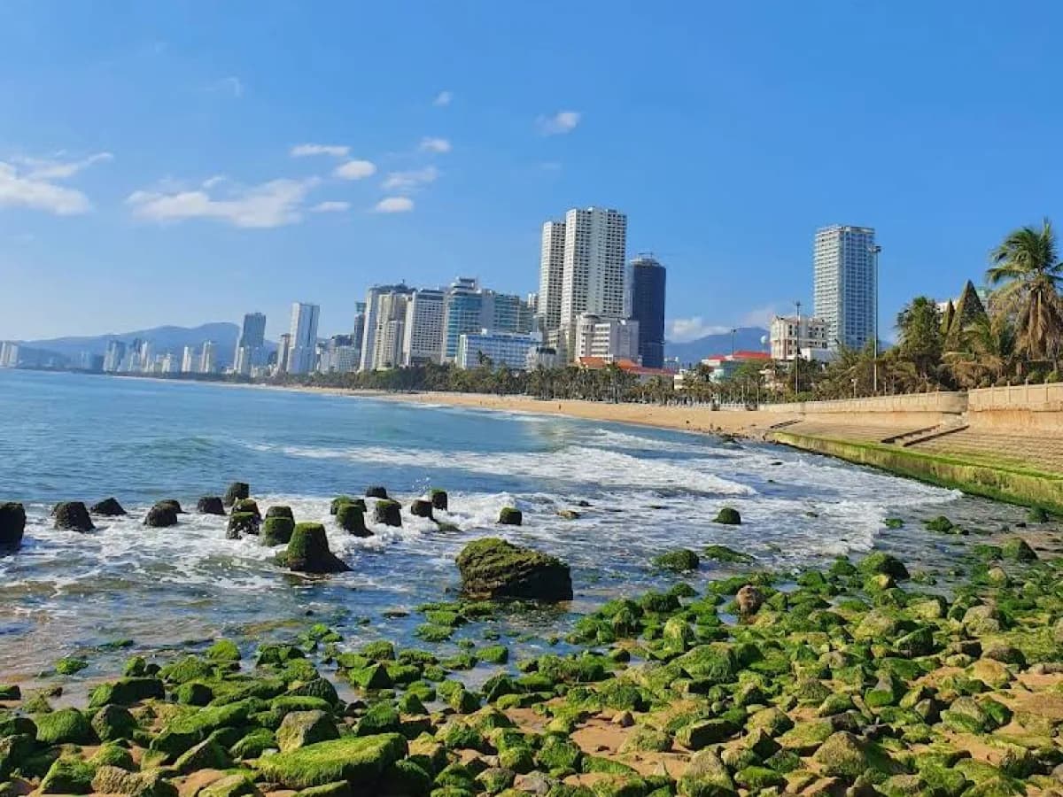 Tourists enjoying the sandy beaches of Nha Trang, Vietnam