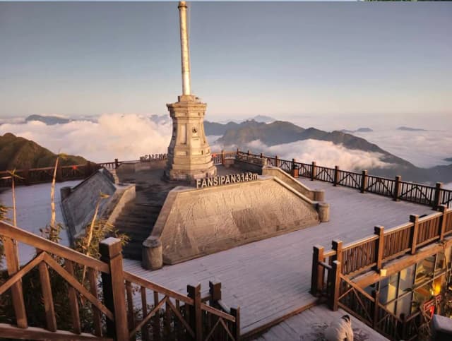 Fansipan Peak with the iconic flagpole above the clouds