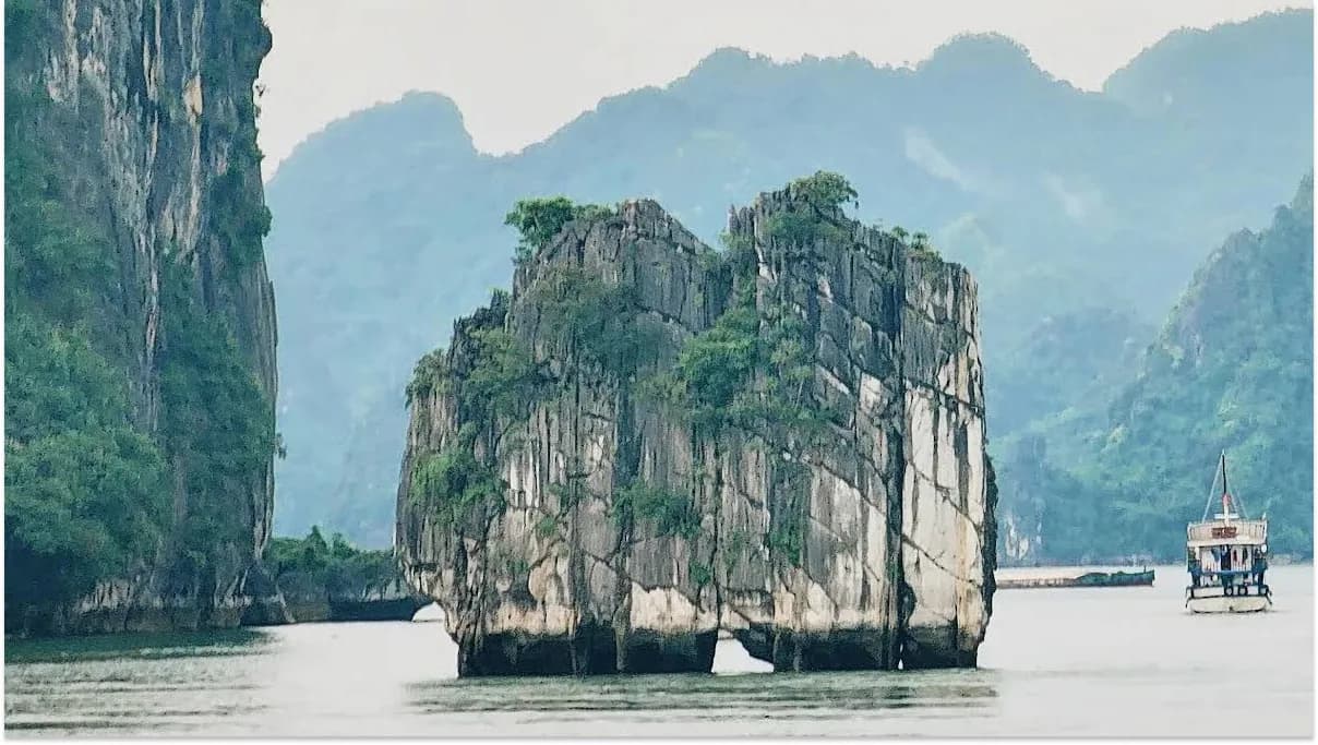 Tourists enjoying the scenic view of Ha Long Bay, Vietnam