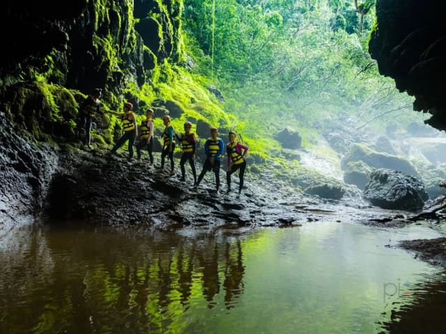 Inside Phong Nha–Ke Bang National Park cave with stunning limestone formations and underground river in Quang Binh, Vietnam