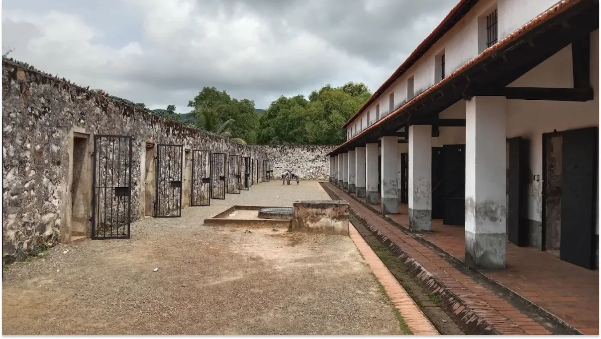 Visitors exploring the cells and courtyards of Con Dao Prison
