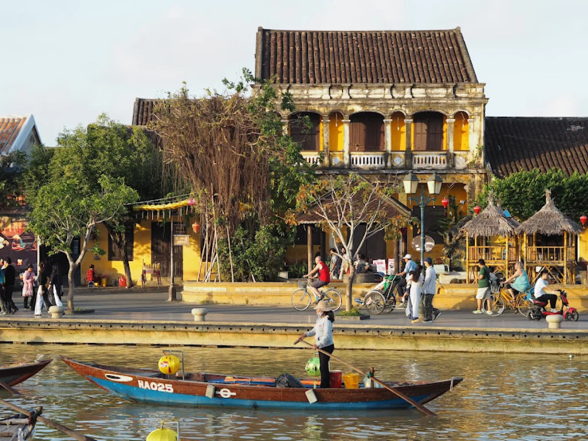 Tourists walking along the charming alleys of Hoi An Ancient Town