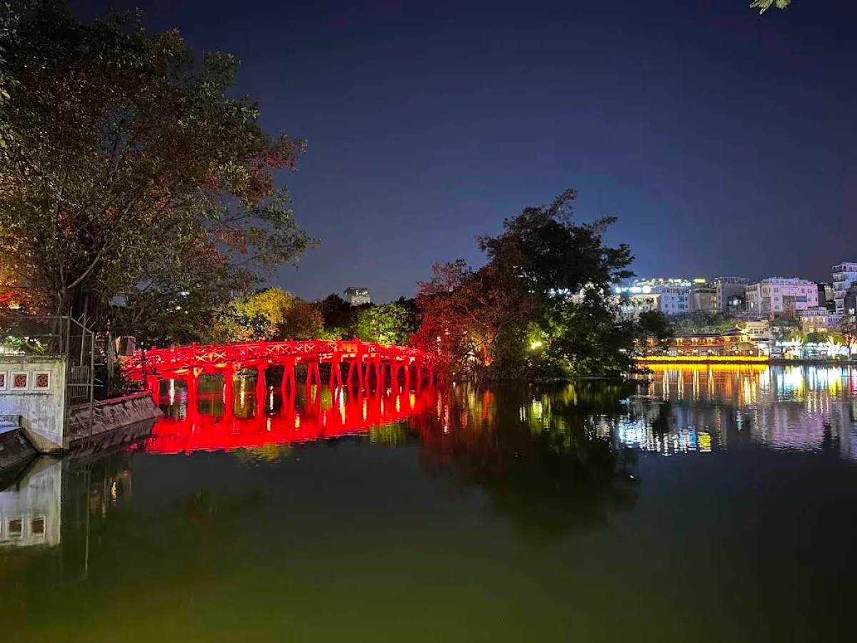 The Huc Bridge at night – a glowing red symbol of Hoan Kiem Lake, Hanoi
