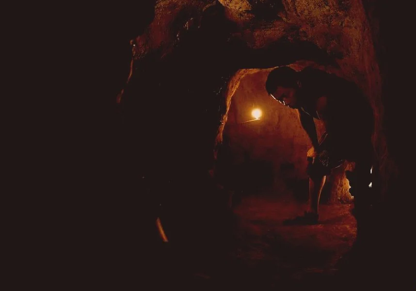 Narrow tunnel interior of Cu Chi used during the Vietnam War