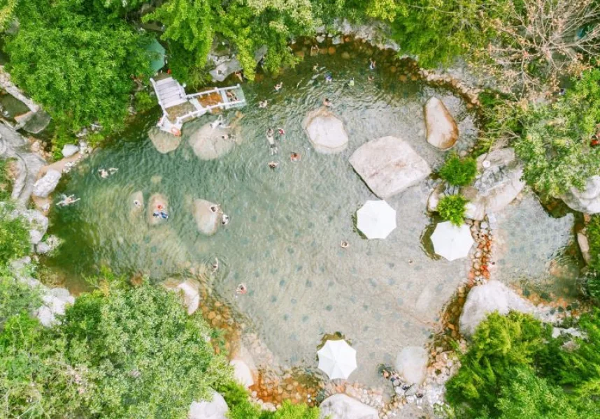 Hidden hot spring in Vietnam surrounded by tropical nature